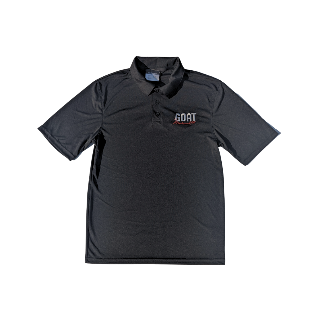Black polo shirt with 'GOAT' logo on a white background